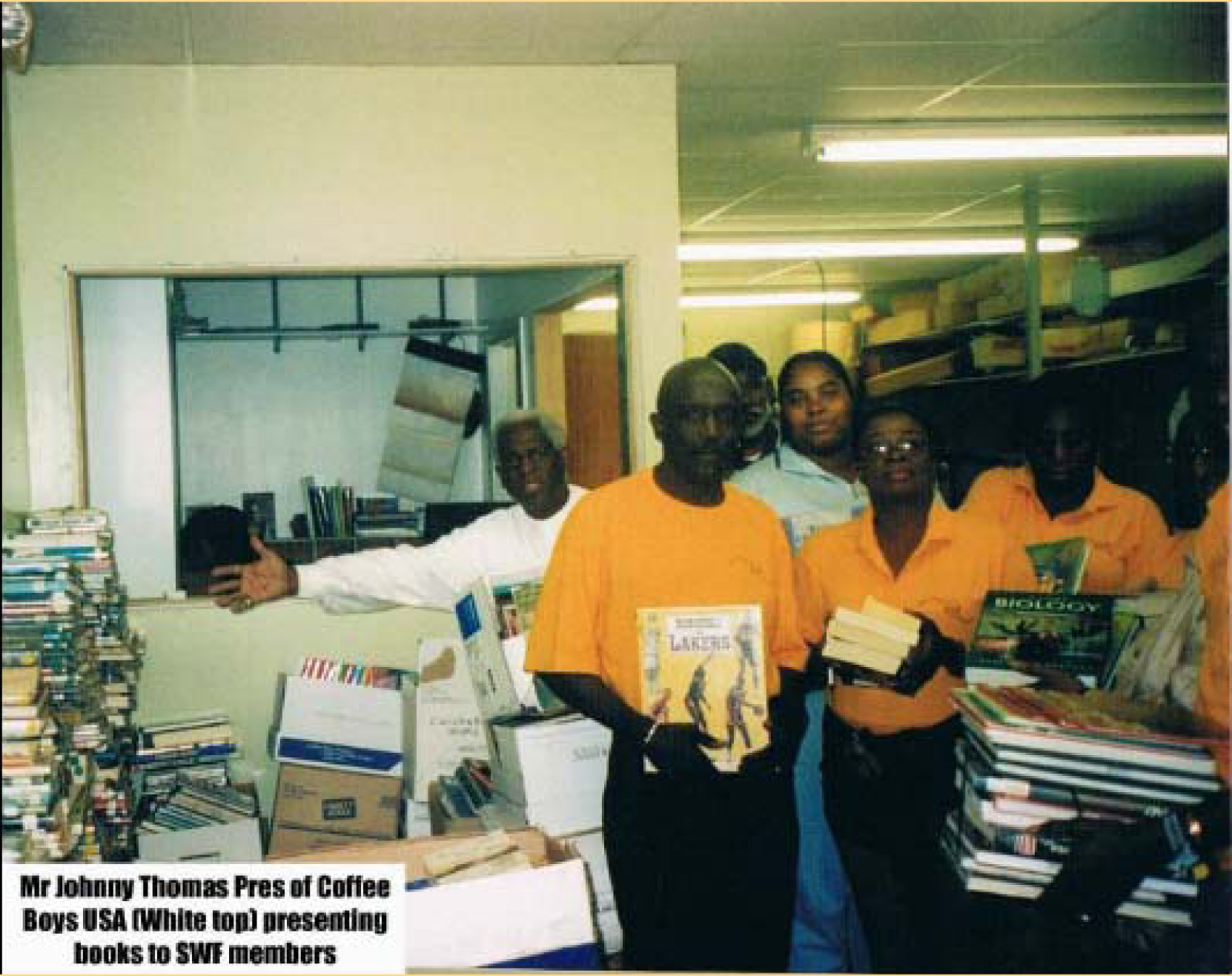 SWF_receiving_books_from_Coffee_Boys_USA_members-2006